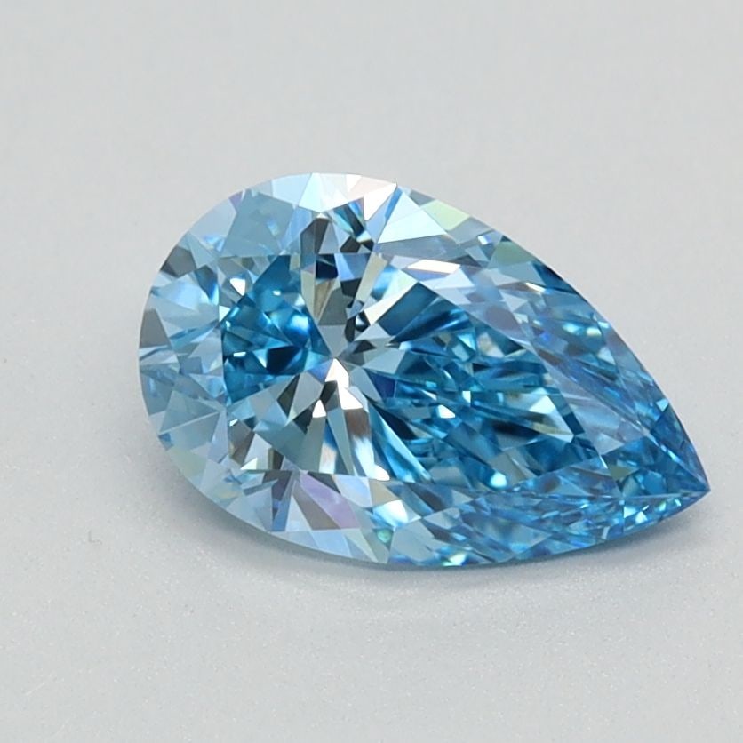 Loose Lab Diamond - IGI Pear 0.9ct Fancy Vivid Blue VVS2: Loose Lab Diamond - IGI Pear 0.9ct Fancy Vivid Blue VVS2 Experience the unparalleled beauty of a lab-grown diamond, certified by the International Gemological Institute (IGI) as Fancy Vivid Blue, with