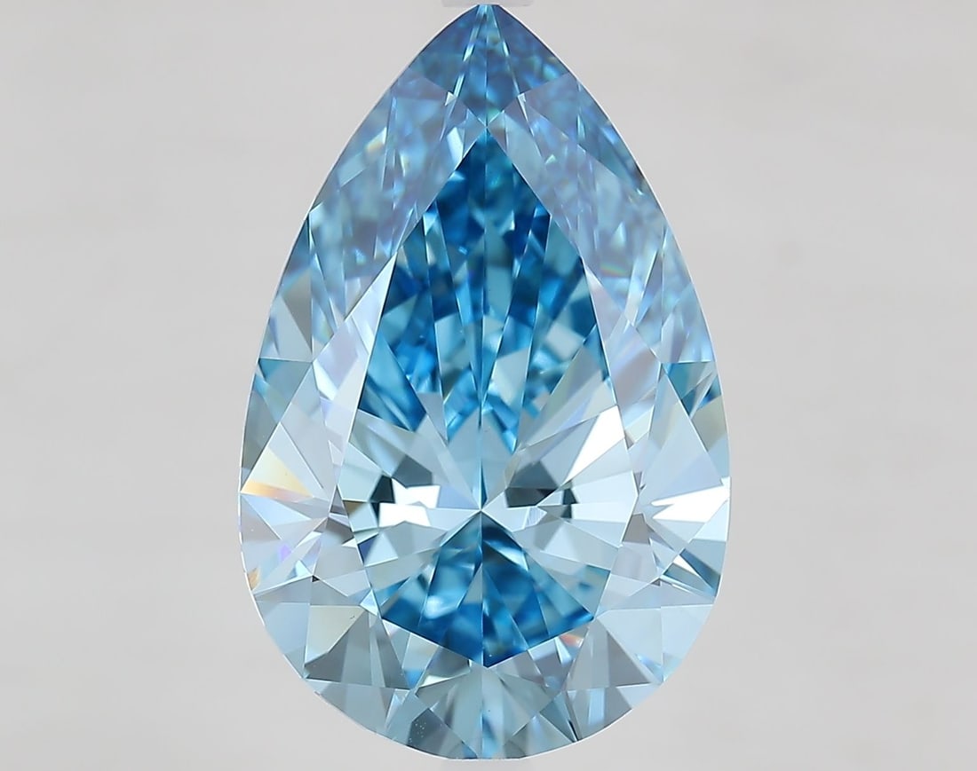 Loose Lab Diamond - IGI Pear 8.56ct Fancy Vivid Blue VVS2: Loose Lab Diamond - IGI Pear 8.56ct Fancy Vivid Blue VVS2 Experience the breathtaking beauty of a lab-grown diamond, certified by the International Gemological Institute (IGI) as Fancy Vivid Blue, wit
