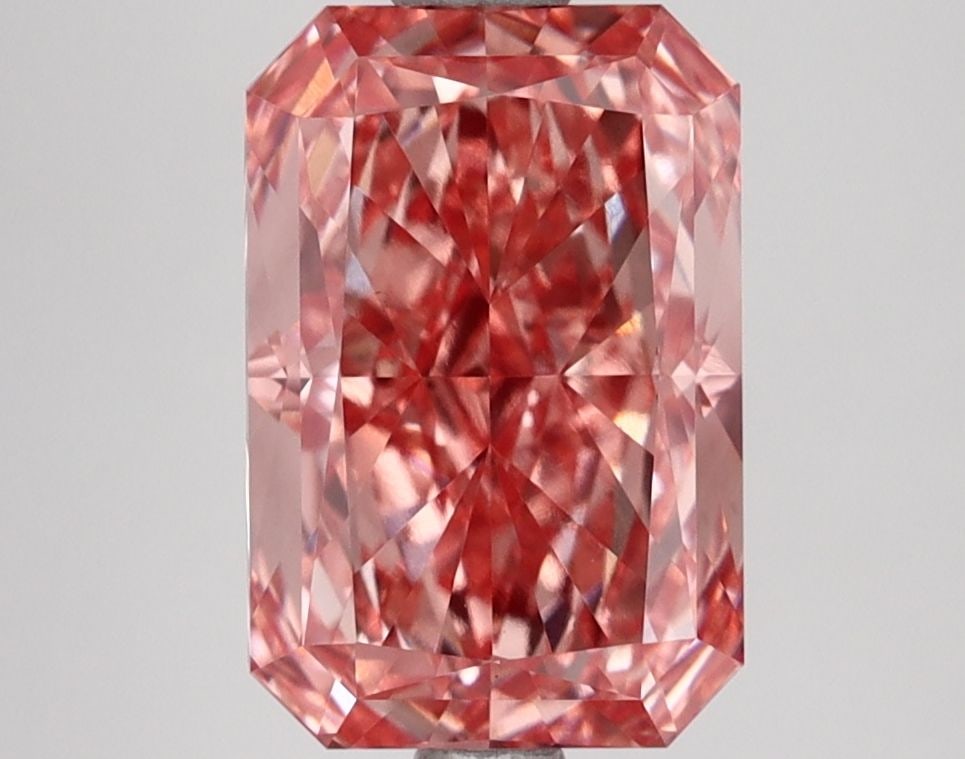IGI Radiant 3.22ct Fancy Vivid Pink VVS2 Loose Lab Diamond: IGI Radiant 3.22ct Fancy Vivid Pink VVS2 Loose Lab Diamond Experience the rare beauty of a Fancy Vivid Pink diamond, one of the most coveted colors in the world of gemstones. This exquisite 3.22ct lab