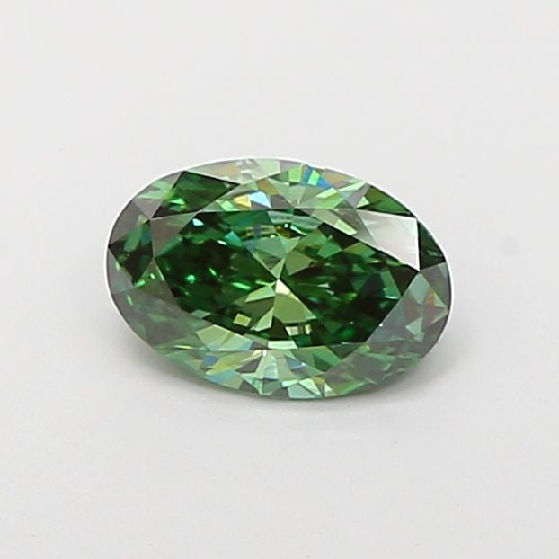 IGI Oval 0.88ct Fancy Vivid Green VVS2 Loose Lab Diamond: IGI Oval 0.88ct Fancy Vivid Green VVS2 Loose Lab Diamond Experience the breathtaking beauty of nature in a lab-grown diamond, certified by IGI as Fancy Vivid Green with exceptional clarity and cut. Th