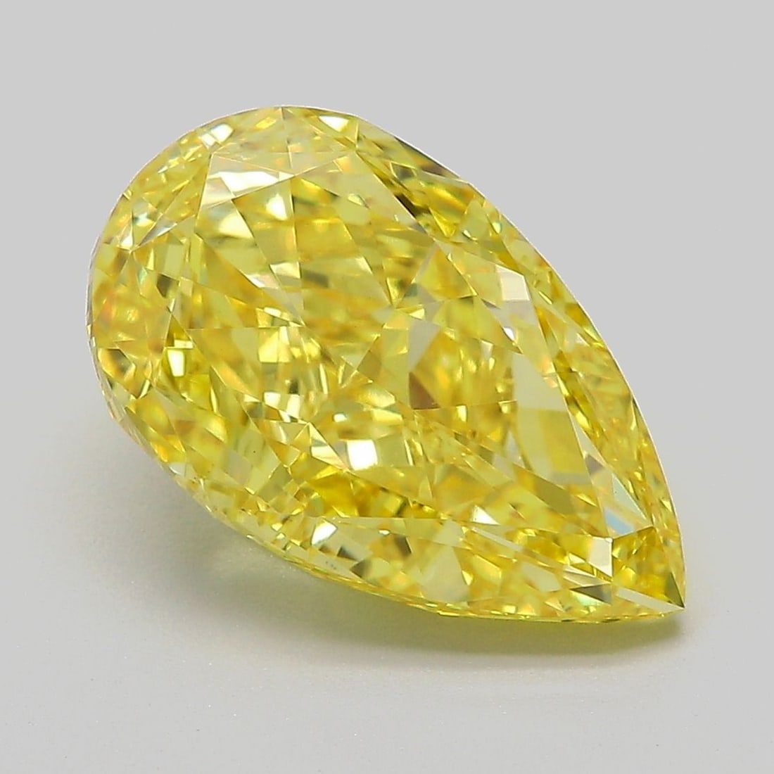 Loose Lab Diamond - IGI Pear 5.41ct Fancy Vivid Yellow VVS2: Loose Lab Diamond - IGI Pear 5.41ct Fancy Vivid Yellow VVS2 Experience the brilliance of nature, reimagined - this stunning 5.41ct lab-grown diamond boasts an exceptional Fancy Vivid Yellow hue and fl