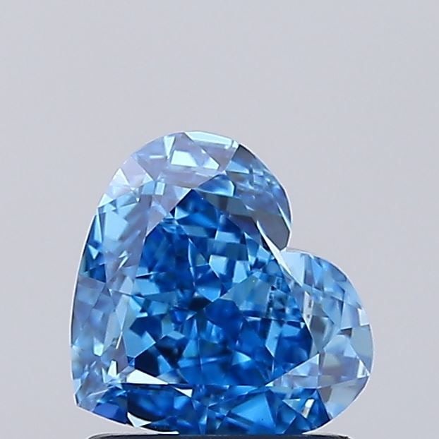 Loose Lab Diamond - IGI Heart 1.07ct Fancy Vivid Blue VVS2: Loose Lab Diamond - IGI Heart 1.07ct Fancy Vivid Blue VVS2 Experience the breathtaking beauty of a lab-grown diamond, certified by the International Gemological Institute (IGI) as Fancy Vivid Blue wit
