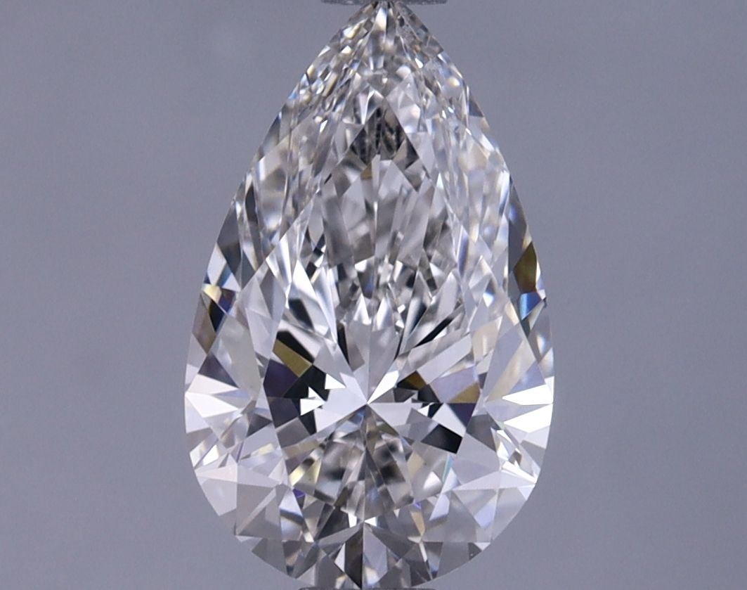 Loose Lab Diamond - IGI Pear 1.24ct G VVS2: Loose Lab Diamond - IGI Pear 1.24ct G VVS2 A rare and exquisite lab-grown diamond, this IGI-certified pear-cut gem boasts a vibrant G color, exceptional clarity (VVS2) and flawless polish (EX). With i