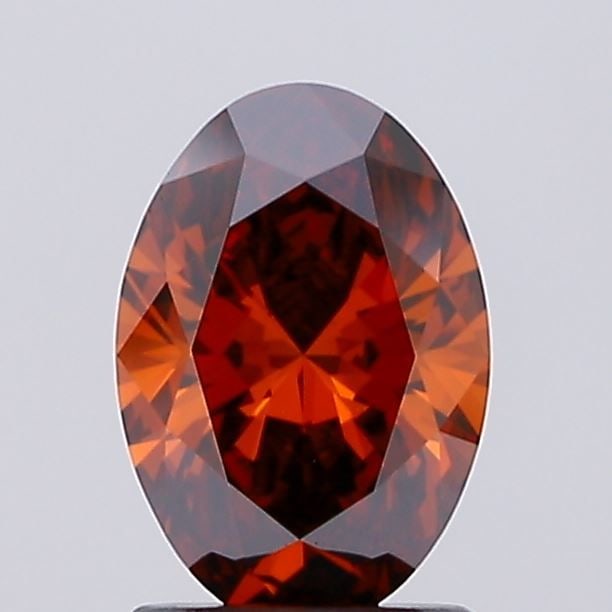 IGI Oval 1.36ct Fancy Deep Orange VVS2 Loose Lab Diamond: IGI Oval 1.36ct Fancy Deep Orange VVS2 Loose Lab Diamond Experience the vibrant beauty of nature with this stunning 1.36ct Fancy Deep Orange VVS2 loose lab diamond, certified by the International Gemo