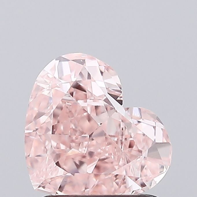 IGI Heart 1.36ct Fancy Intense Pink VVS2 Loose Lab Diamond: IGI Heart 1.36ct Fancy Intense Pink VVS2 Loose Lab Diamond Experience the rare beauty of a Fancy Intense Pink diamond, one of the most coveted colors in the world of gemstones. This stunning 1.36ct la