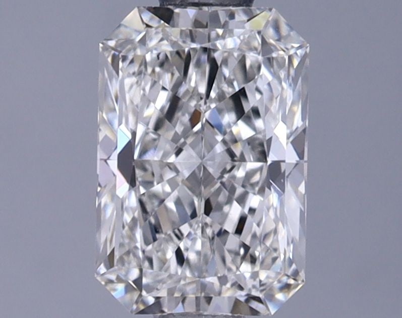 IGI Radiant 0.9ct F VVS2 Loose Lab Diamond: IGI Radiant 0.9ct F VVS2 Loose Lab Diamond Experience the brilliance of a lab-grown diamond, certified by IGI as F color, VVS2 clarity, and EX polish and symmetry. This 0.9ct radiant gemstone is a rar