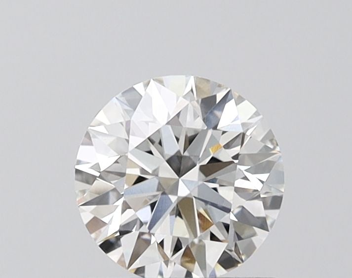 IGI Round 0.9ct F VVS1 Ideal Loose Lab Diamond: IGI Round 0.9ct F VVS1 Ideal Loose Lab Diamond A rare and exceptional lab-grown diamond, certified by the International Gemological Institute (IGI), boasts an impressive 0.9 carats of flawless VVS1 cl