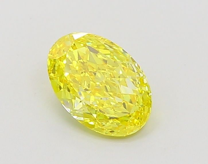 IGI Oval 1.01ct Fancy Vivid Yellow VVS2 Loose Lab Diamond: IGI Oval 1.01ct Fancy Vivid Yellow VVS2 Loose Lab Diamond Experience the vibrant beauty of nature with this stunning 1.01ct Fancy Vivid Yellow VVS2 lab-grown diamond, certified by the International Ge