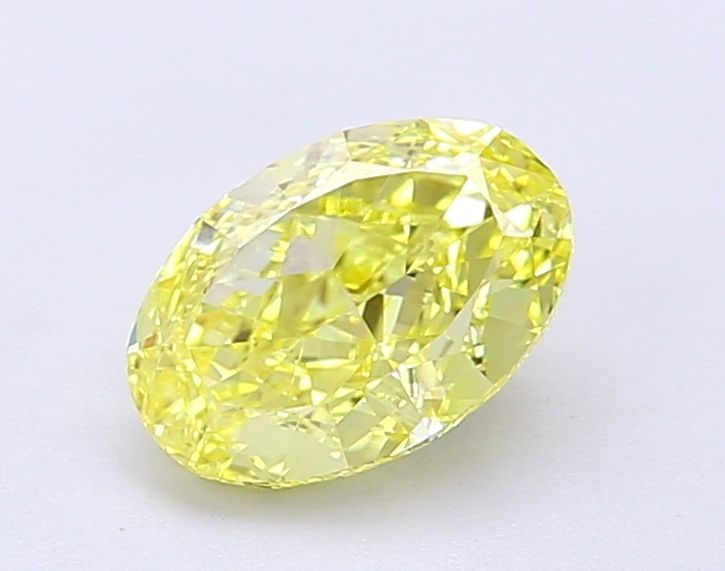 IGI Oval 1.26ct Fancy Vivid Yellow VVS2 Loose Lab Diamond: IGI Oval 1.26ct Fancy Vivid Yellow VVS2 Loose Lab Diamond Experience the radiant beauty of a lab-grown diamond, certified by IGI as Fancy Vivid Yellow with exceptional clarity and polish. This 1.26ct