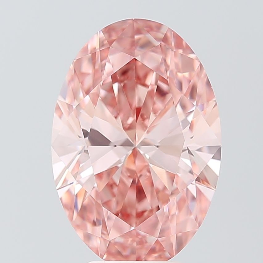 IGI Oval 5.23ct Fancy Vivid Pink VVS2 Loose Lab Diamond: IGI Oval 5.23ct Fancy Vivid Pink VVS2 Loose Lab Diamond Experience the rare beauty of a Fancy Vivid Pink diamond, one of the most coveted colors in the world of gemstones. This stunning 5.23ct lab-gro