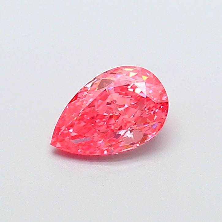 Loose Lab Diamond - IGI Pear 1.03ct Fancy Vivid Pink VVS2: Loose Lab Diamond - IGI Pear 1.03ct Fancy Vivid Pink VVS2 Experience the rare beauty of a lab-grown diamond, certified by IGI as a Fancy Vivid Pink gemstone with exceptional clarity and polish. This s