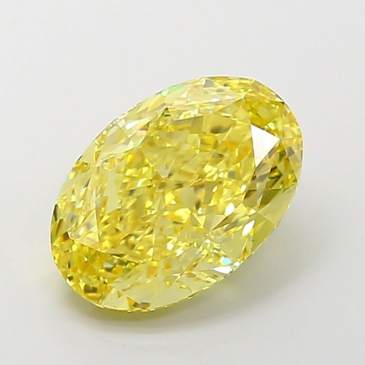 IGI Oval 5.45ct Fancy Vivid Yellow VVS2 Loose Lab Diamond: IGI Oval 5.45ct Fancy Vivid Yellow VVS2 Loose Lab Diamond A true gem for the discerning collector, this 5.45ct Fancy Vivid Yellow VVS2 lab-grown diamond shines with exceptional brilliance and fire. It