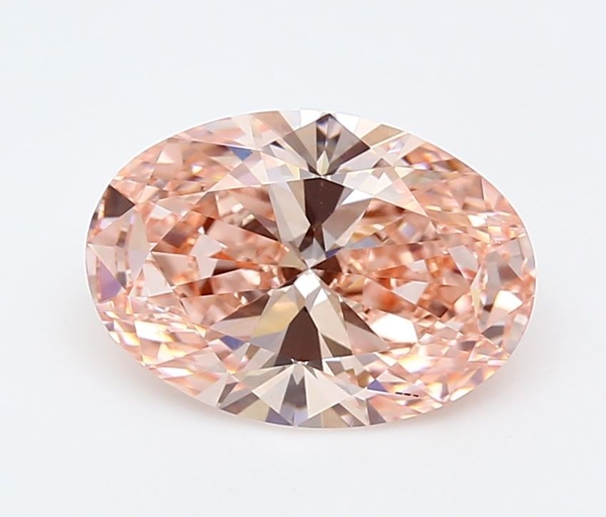 IGI Oval 3.04ct Fancy Vivid Pink VVS2 Loose Lab Diamond: IGI Oval 3.04ct Fancy Vivid Pink VVS2 Loose Lab Diamond Experience the rare beauty of a Fancy Vivid Pink diamond, one of the most coveted colors in the world of gemstones. This exquisite 3.04ct lab-gr