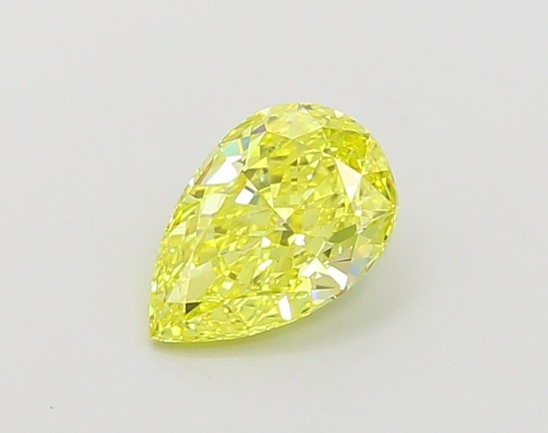 Loose Lab Diamond - IGI Pear 1.01ct Fancy Vivid Yellow VVS1: Loose Lab Diamond - IGI Pear 1.01ct Fancy Vivid Yellow VVS1 Experience the brilliance of nature's own sunshine in this exquisite 1.01ct Fancy Vivid Yellow Lab Diamond, certified by IGI as VVS1 clarity