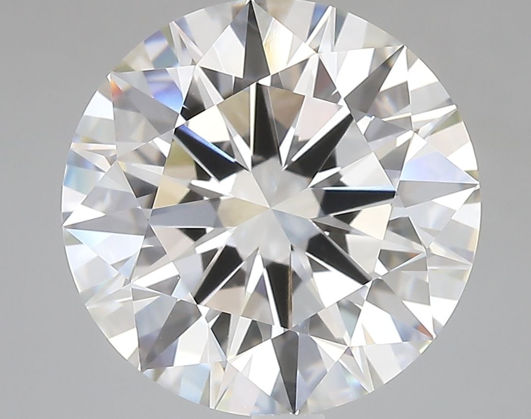 IGI Round 7.08ct E VVS2 Ideal Loose Lab Diamond: IGI Round 7.08ct E VVS2 Ideal Loose Lab Diamond Experience the brilliance of a lab-grown diamond, certified by IGI as a 7.08ct E VVS2 Ideal Round cut gemstone. With its EX polish and symmetry, this st