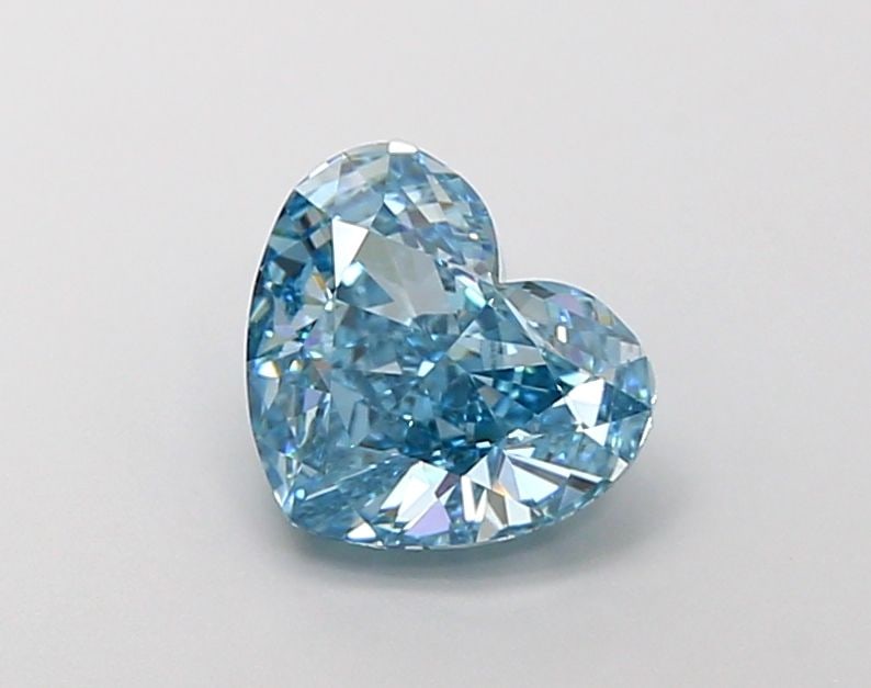 Loose Lab Diamond - IGI Heart 2.4ct Fancy Vivid Blue VVS2: Loose Lab Diamond - IGI Heart 2.4ct Fancy Vivid Blue VVS2 Experience the breathtaking beauty of a lab-grown diamond, certified by the International Gemological Institute (IGI) as Fancy Vivid Blue, wit