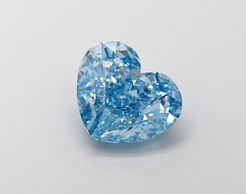 Loose Lab Diamond - IGI Heart 2.0ct Fancy Vivid Blue VVS2: Loose Lab Diamond - IGI Heart 2.0ct Fancy Vivid Blue VVS2 Experience the breathtaking beauty of a lab-grown diamond, certified by the International Gemological Institute (IGI) as Fancy Vivid Blue, wit