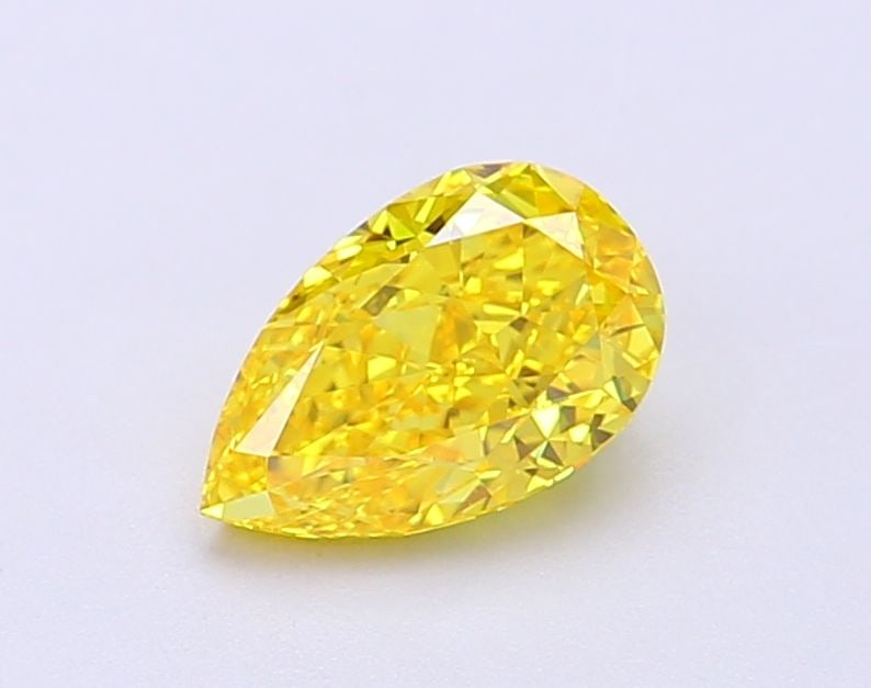 Loose Lab Diamond - IGI Pear 1.02ct Fancy Vivid Yellow VVS2: Loose Lab Diamond - IGI Pear 1.02ct Fancy Vivid Yellow VVS2 Experience the brilliance of a lab-grown diamond, certified by the International Gemological Institute (IGI) as Fancy Vivid Yellow with exce