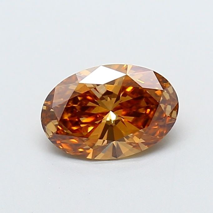 IGI Oval 1.03ct Fancy Brown VVS2 Loose Lab Diamond: IGI Oval 1.03ct Fancy Brown VVS2 Loose Lab Diamond A rare and exquisite addition to any jewelry collection, this 1.03ct Fancy Brown VVS2 lab-grown diamond boasts exceptional clarity and a rich, warm c