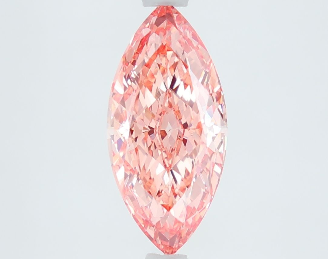 IGI Marquise 1.94ct Fancy Intense Pink VVS2 Loose Lab Diamond: IGI Marquise 1.94ct Fancy Intense Pink VVS2 Loose Lab Diamond Experience the rare beauty of a Fancy Intense Pink diamond, one of the most coveted colors in the world of gemstones. This exquisite 1.94c