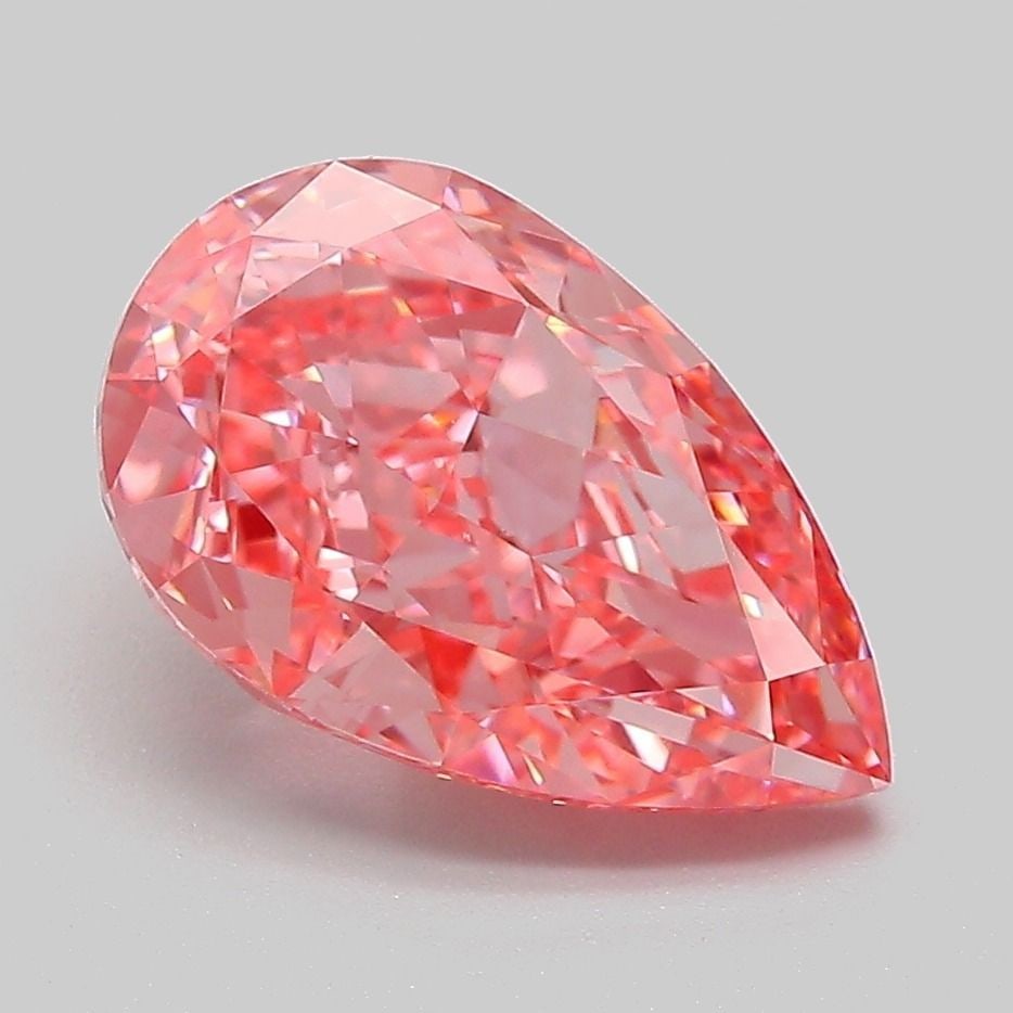 Loose Lab Diamond - IGI Pear 3.09ct Fancy Vivid Pink VVS2: Loose Lab Diamond - IGI Pear 3.09ct Fancy Vivid Pink VVS2 A truly unique gem, this 3.09ct lab-grown diamond boasts an extraordinary Fancy Vivid Pink hue, rivaling the most vibrant natural rubies. Its