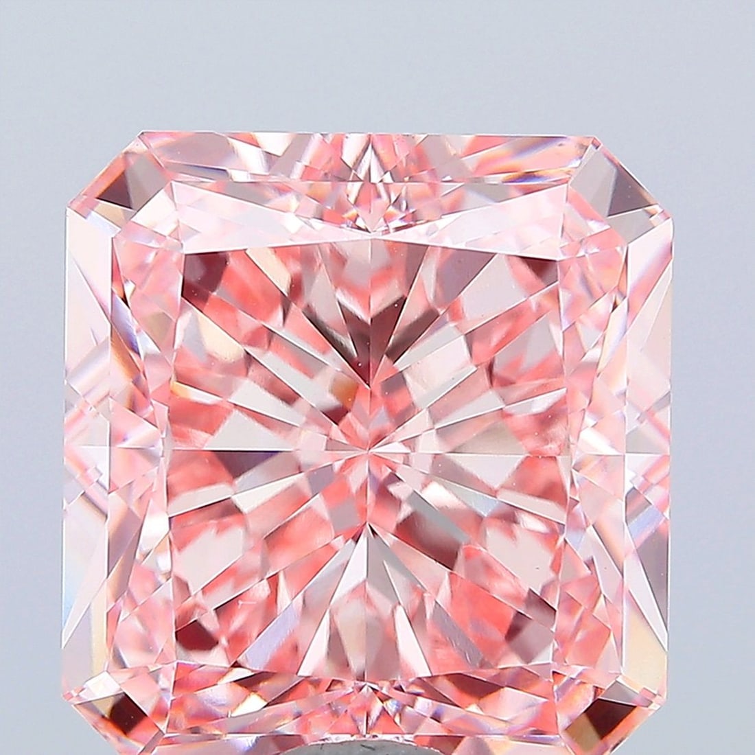 IGI Radiant 27.4ct Fancy Vivid Pink VVS2 Loose Lab Diamond: IGI Radiant 27.4ct Fancy Vivid Pink VVS2 Loose Lab Diamond Experience the rare beauty of a Fancy Vivid Pink diamond, one of the most coveted colors in the world of gemstones. This stunning 27.4ct lab-