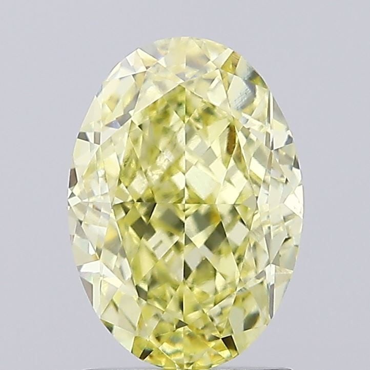 IGI Oval 2.01ct Fancy Yellow VVS2 Loose Lab Diamond: IGI Oval 2.01ct Fancy Yellow VVS2 Loose Lab Diamond A true gem for the discerning collector, this 2.01ct Fancy Yellow VVS2 Loose Lab Diamond boasts exceptional clarity and color, with a vibrant yellow