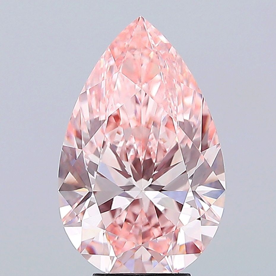 Loose Lab Diamond - IGI Pear 6.02ct Fancy Vivid Pink VVS2: Loose Lab Diamond - IGI Pear 6.02ct Fancy Vivid Pink VVS2 A stunning Fancy Vivid Pink lab diamond, certified by the International Gemological Institute (IGI), boasts exceptional clarity and polish, wi
