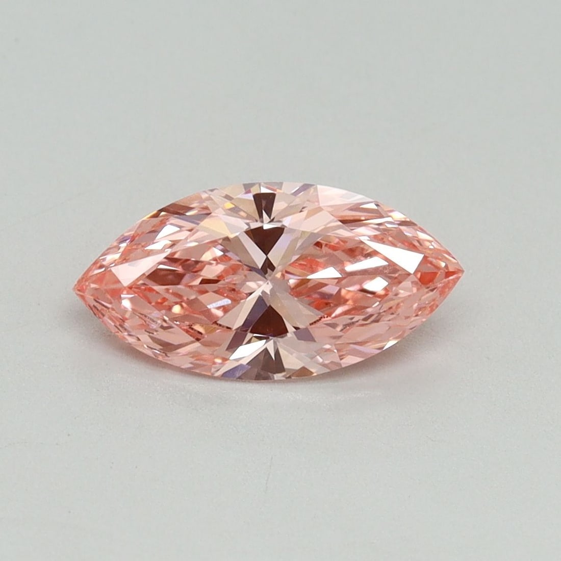 IGI Marquise 1.04ct Fancy Vivid Pink VVS2 Loose Lab Diamond: IGI Marquise 1.04ct Fancy Vivid Pink VVS2 Loose Lab Diamond Experience the rare beauty of a Fancy Vivid Pink diamond, one of the most coveted colors in the world of gemstones. This stunning 1.04ct lab