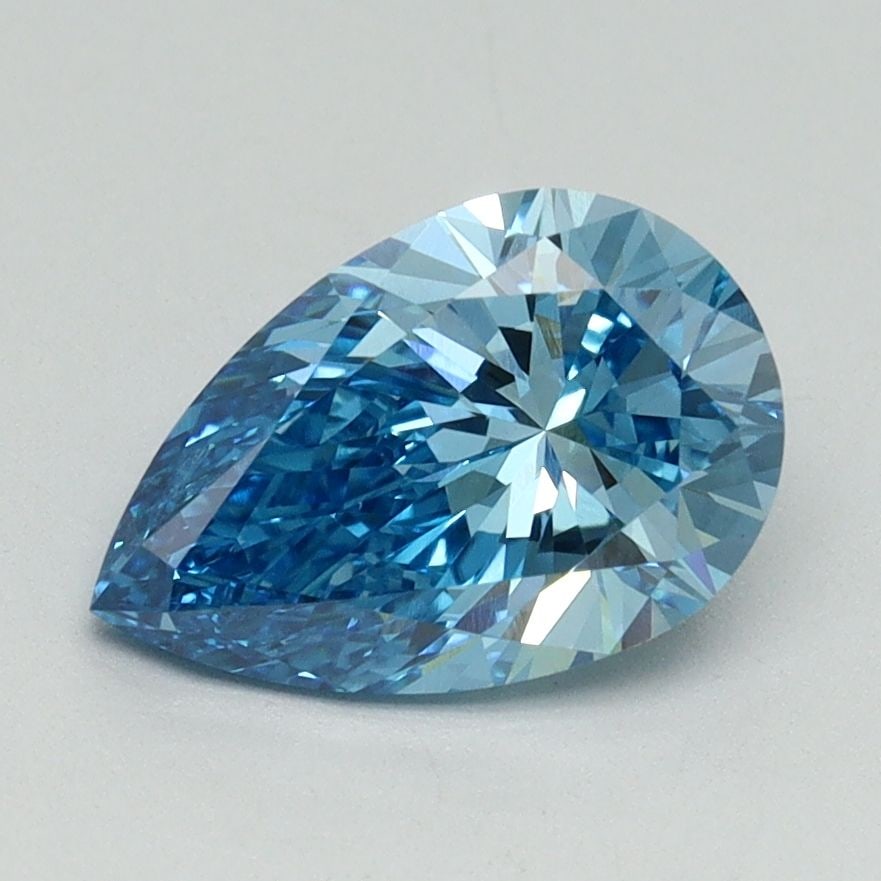 Loose Lab Diamond - IGI Pear 1.55ct Fancy Vivid Blue VVS2: Loose Lab Diamond - IGI Pear 1.55ct Fancy Vivid Blue VVS2 Experience the unparalleled beauty of a lab-grown diamond, certified by the International Gemological Institute (IGI) as Fancy Vivid Blue,
