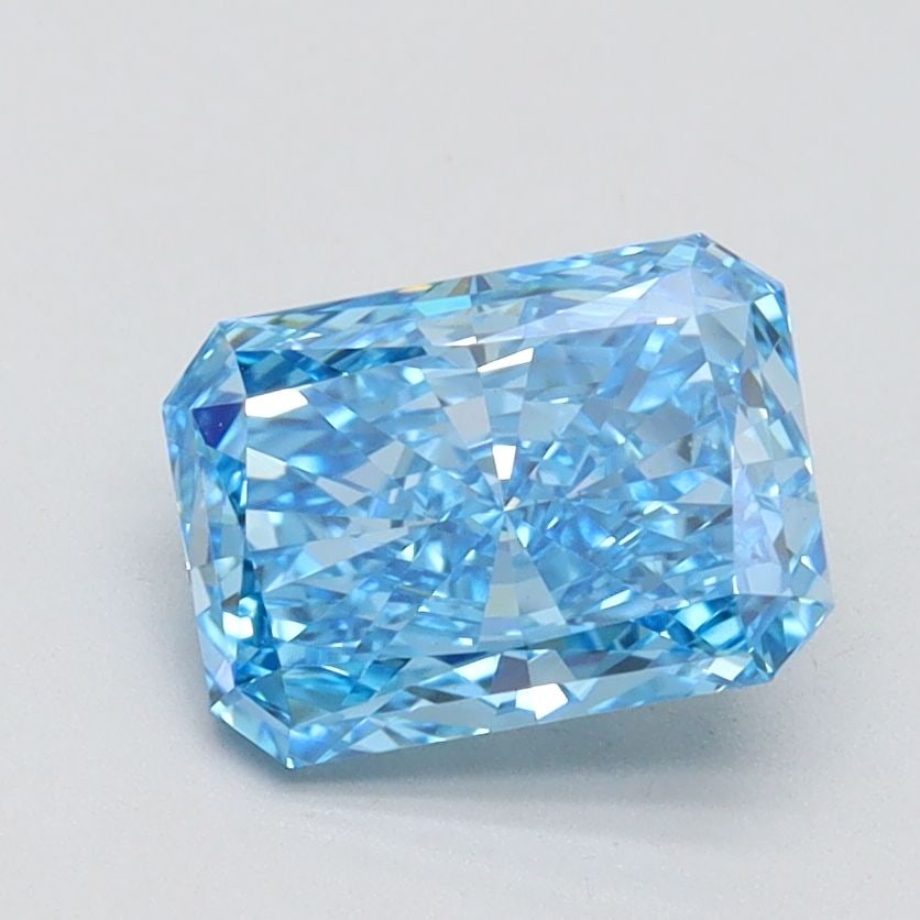 IGI Radiant 1.5ct Fancy Vivid Blue VVS2 Loose Lab Diamond: IGI Radiant 1.5ct Fancy Vivid Blue VVS2 Loose Lab Diamond Experience the breathtaking beauty of a Fancy Vivid Blue diamond, one of the rarest and most coveted colors in nature. This exquisite 1.5ct