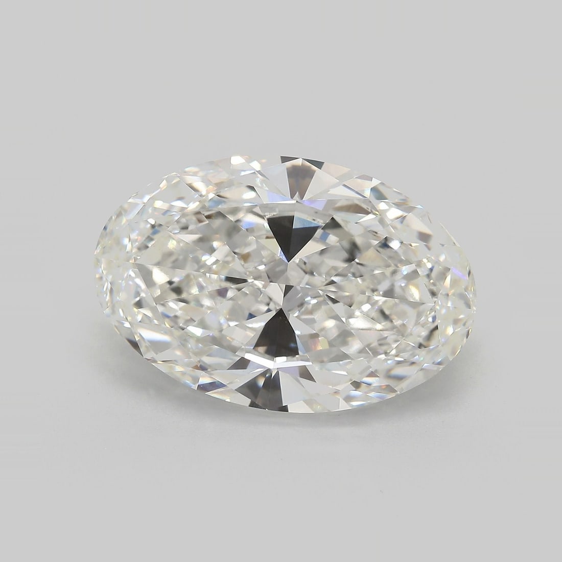 IGI Oval 15.64ct G VVS2 Loose Lab Diamond: IGI Oval 15.64ct G VVS2 Loose Lab Diamond Experience the unparalleled brilliance of a lab-grown diamond, certified by IGI as a stunning 15.64ct G VVS2 Oval cut gemstone. Its exceptional clarity and