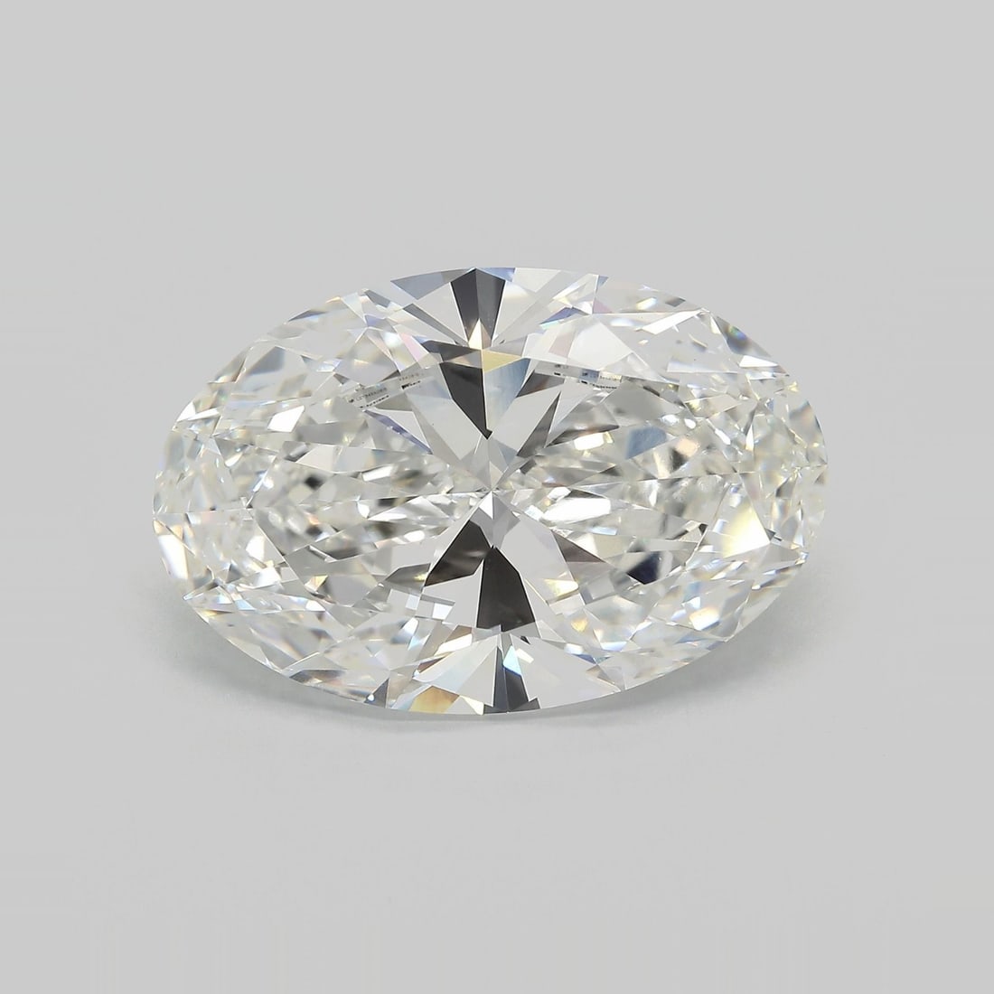 IGI Oval 14.62ct G VVS2 Loose Lab Diamond: IGI Oval 14.62ct G VVS2 Loose Lab Diamond Experience the exceptional beauty of this stunning 14.62ct IGI Oval lab-grown diamond, boasting an impressive G color and VVS2 clarity for maximum