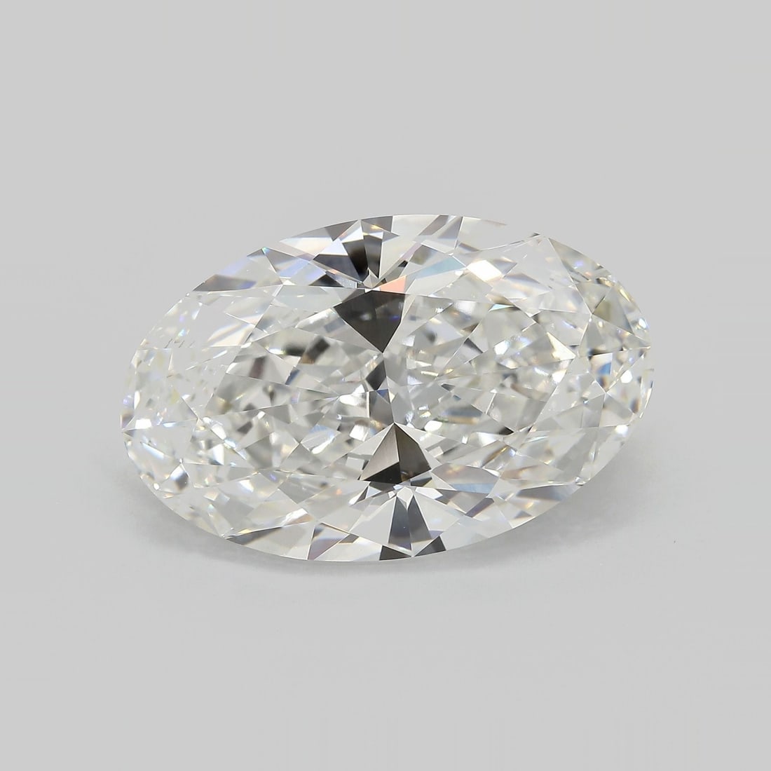 IGI Oval 15.27ct F VVS2 Loose Lab Diamond: IGI Oval 15.27ct F VVS2 Loose Lab Diamond Experience the unparalleled brilliance of a lab-grown IGI Oval diamond, boasting an impressive 15.27 carats in its exceptional VVS2 clarity and F color grade.
