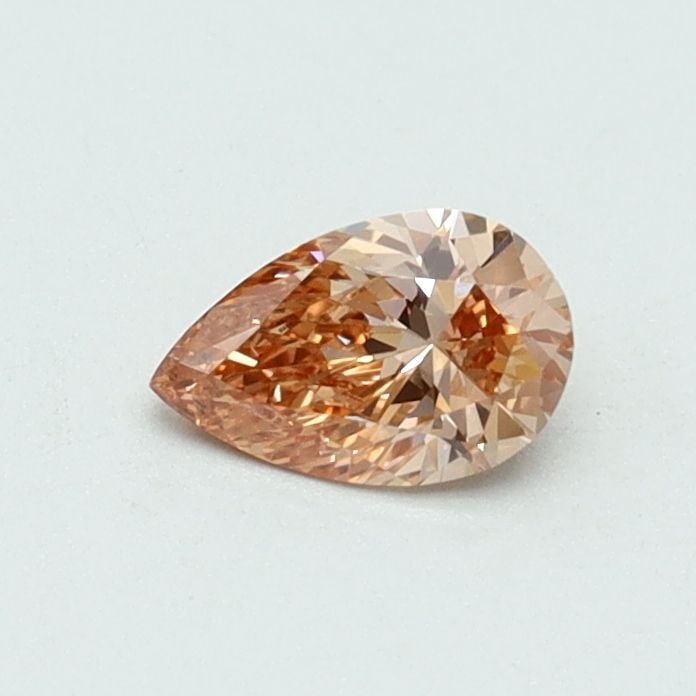 Loose Lab Diamond - IGI Pear 0.3ct Fancy Intense Pinkish Orange IF: Loose Lab Diamond - IGI Pear 0.3ct Fancy Intense Pinkish Orange IF Experience the rare beauty of a lab-grown diamond, certified by IGI as Fancy Intense Pinkish Orange, with exceptional clarity and pol