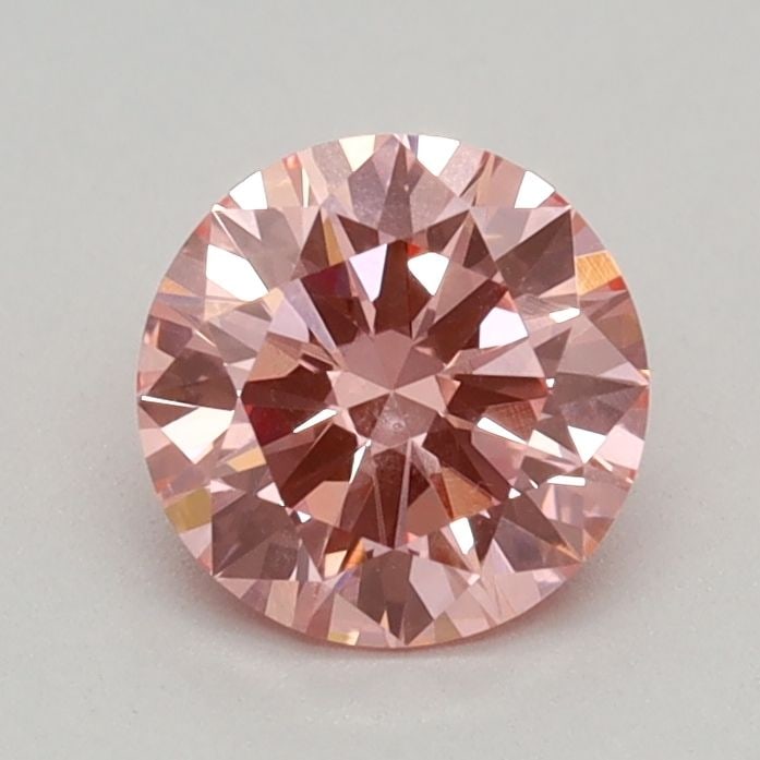 IGI Round 0.45ct Fancy Vivid Pink VVS2 Loose Lab Diamond: IGI Round 0.45ct Fancy Vivid Pink VVS2 Loose Lab Diamond Experience the rare beauty of a Fancy Vivid Pink diamond, one of the most coveted colors in the world of gemstones. This exquisite 0.45ct lab-g