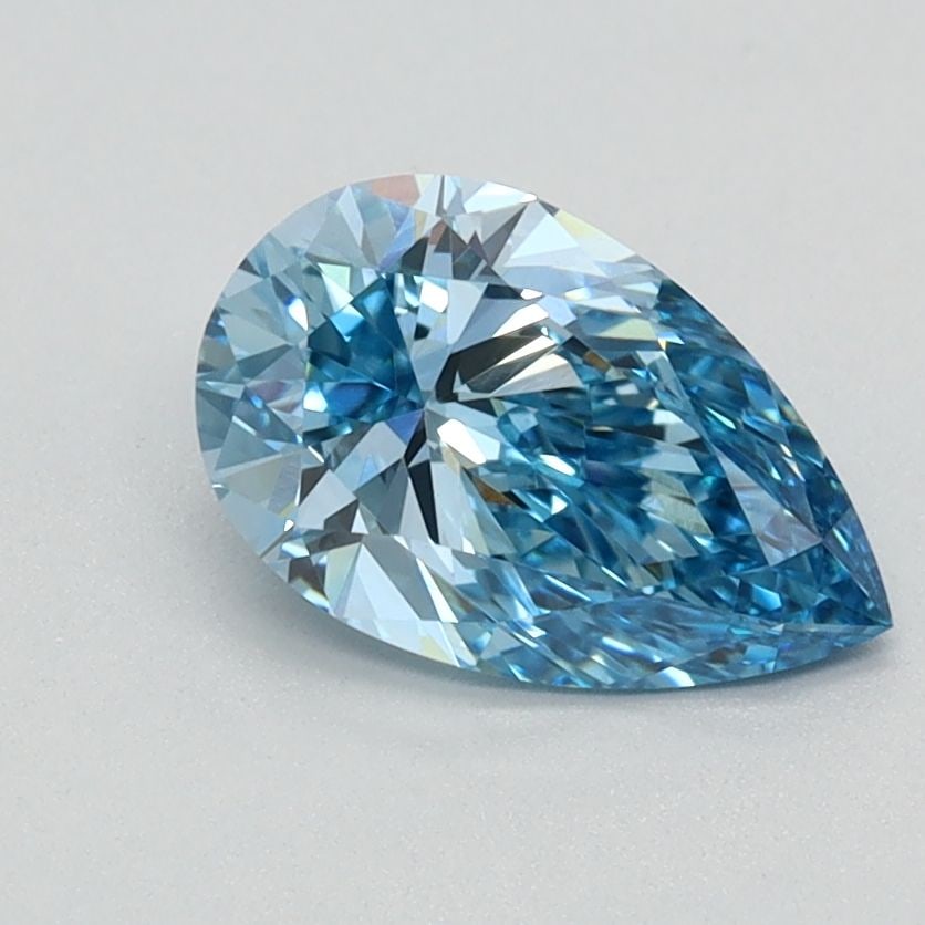 Loose Lab Diamond - IGI Pear 0.92ct Fancy Vivid Blue VVS2: Loose Lab Diamond - IGI Pear 0.92ct Fancy Vivid Blue VVS2 Experience the breathtaking beauty of a lab-grown diamond, certified by IGI as Fancy Vivid Blue, with exceptional clarity and cut. This stunni