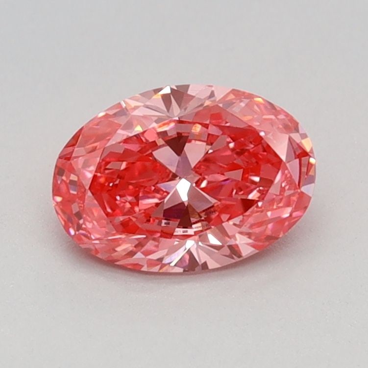 IGI Oval 0.57ct Fancy Vivid Pink VVS1 Loose Lab Diamond: IGI Oval 0.57ct Fancy Vivid Pink VVS1 Loose Lab Diamond Experience the beauty of nature in a lab-grown wonder - this 0.57ct Fancy Vivid Pink VVS1 diamond is a true marvel, boasting exceptional clarity