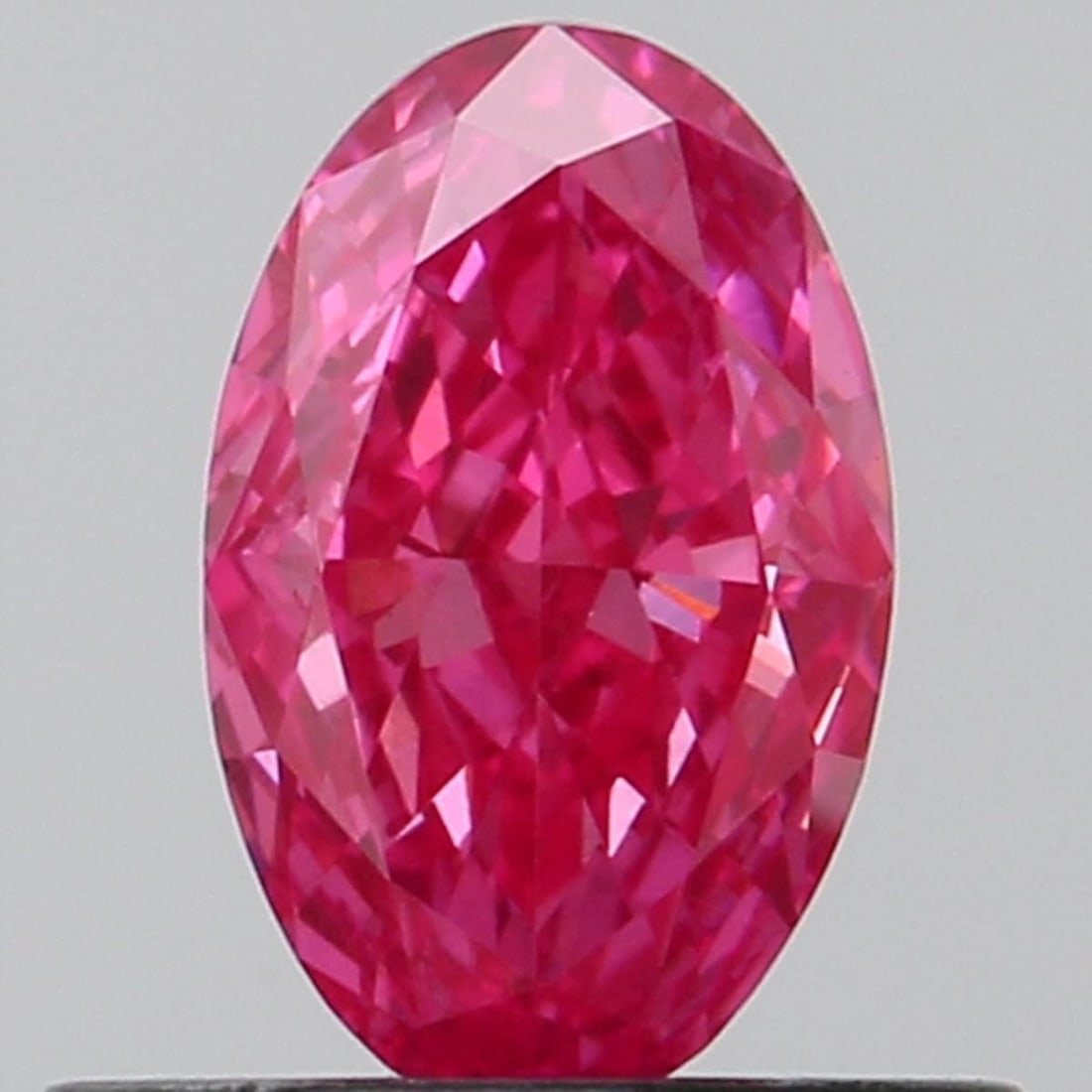 Loose Lab Diamond - Oval 0.51ct Fancy Vivid Pink VVS2: Loose Lab Diamond - Oval 0.51ct Fancy Vivid Pink VVS2 Experience the breathtaking beauty of a lab-grown diamond, boasting an exceptional 0.51 carat Fancy Vivid Pink hue that's sure to turn heads. With