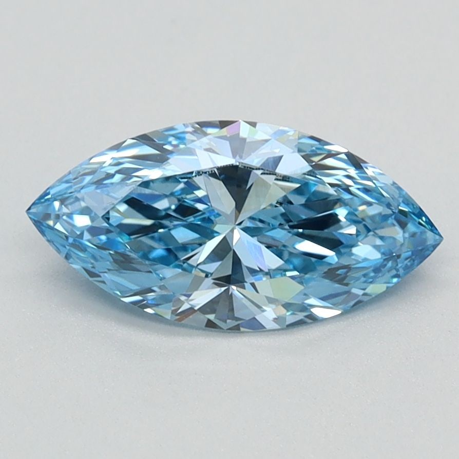 IGI Marquise 0.92ct Fancy Vivid Blue VVS2 Loose Lab Diamond: IGI Marquise 0.92ct Fancy Vivid Blue VVS2 Loose Lab Diamond Experience the rare beauty of a Fancy Vivid Blue diamond, one of the most coveted colors in the world of gemstones. This stunning 0.92ct lab