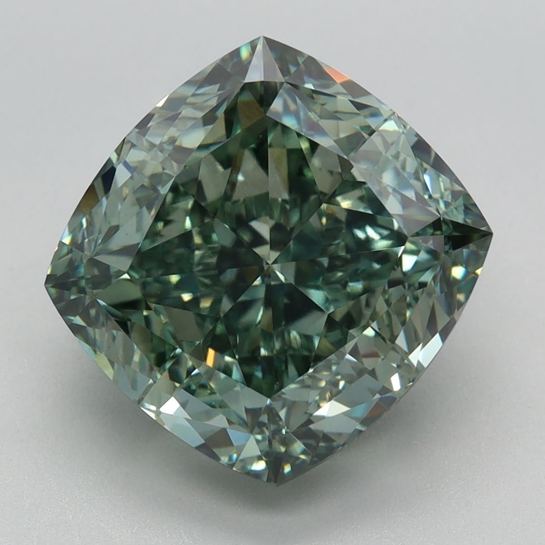 Loose Lab Diamond - IGI Cushion Modified 6.27ct Fancy Vivid Green VVS2: Loose Lab Diamond - IGI Cushion Modified 6.27ct Fancy Vivid Green VVS2 Experience the rare beauty of a Fancy Vivid Green lab-grown diamond, certified by the International Gemological Institute (IGI).