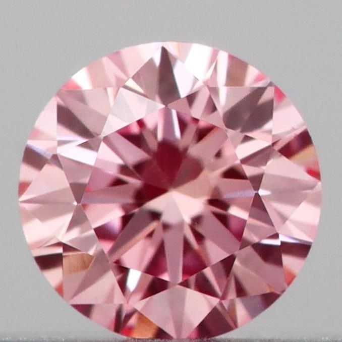 IGI Round 0.16ct Fancy Vivid Pink VVS2 Loose Lab Diamond: IGI Round 0.16ct Fancy Vivid Pink VVS2 Loose Lab Diamond Experience the rare beauty of a Fancy Vivid Pink diamond, one of the most coveted colors in the world of gemstones. This exceptional 0.16ct lab