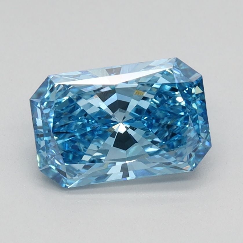 IGI Radiant 0.96ct Fancy Vivid Blue VVS2 Loose Lab Diamond: IGI Radiant 0.96ct Fancy Vivid Blue VVS2 Loose Lab Diamond Experience the rare beauty of a Fancy Vivid Blue lab-grown diamond, boasting exceptional clarity and cut quality. This stunning 0.96ct stone