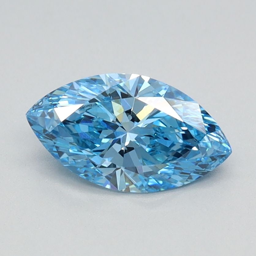 IGI Marquise 0.72ct Fancy Vivid Blue VVS2 Loose Lab Diamond: IGI Marquise 0.72ct Fancy Vivid Blue VVS2 Loose Lab Diamond Experience the rare beauty of a Fancy Vivid Blue diamond, one of the most coveted colors in nature. This stunning 0.72ct lab-grown gem boast