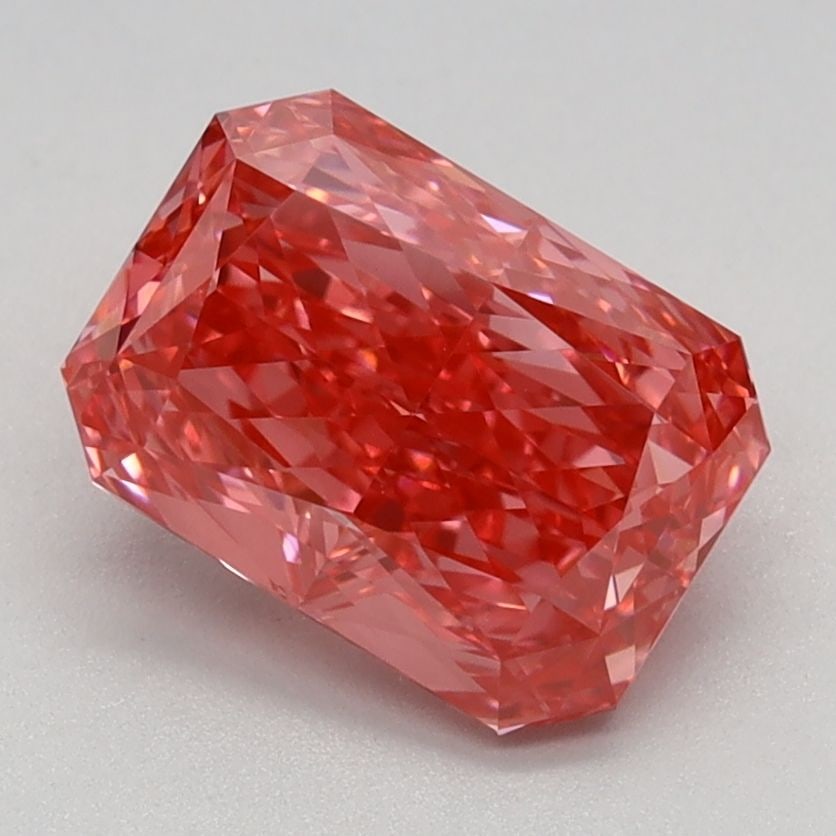 IGI Radiant 1.59ct Fancy Vivid Pink VVS2 Loose Lab Diamond: IGI Radiant 1.59ct Fancy Vivid Pink VVS2 Loose Lab Diamond Experience the unparalleled beauty of a lab-grown diamond, certified by the International Gemological Institute (IGI) as Fancy Vivid Pink wit