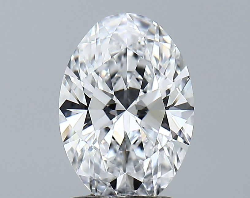 GIA Oval 1.57ct D VVS2 Diamond: GIA Oval 1.57ct D VVS2 Diamond Experience the unparalleled brilliance of this stunning GIA-certified oval diamond, boasting an impressive 1.57 carats in exceptional clarity and cut. Its color is a rar