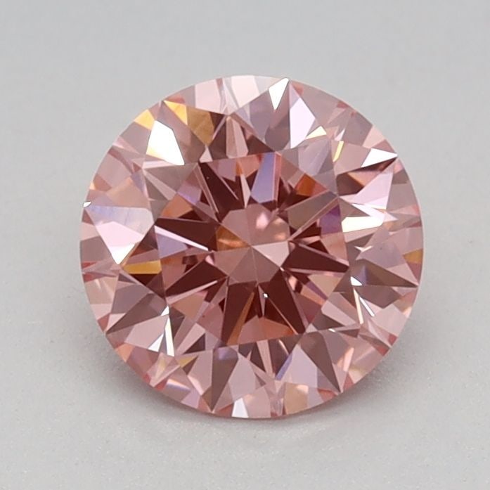 IGI Round 0.71ct Fancy Vivid Pink VVS2 Ideal Loose Lab Diamond: IGI Round 0.71ct Fancy Vivid Pink VVS2 Ideal Loose Lab Diamond Experience the beauty of nature in a lab-grown diamond, certified by IGI as Fancy Vivid Pink with exceptional clarity and polish. This 0.