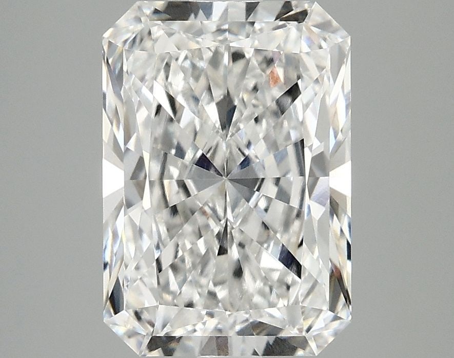 IGI Radiant 3.1ct E VVS2 Loose Lab Diamond: IGI Radiant 3.1ct E VVS2 Loose Lab Diamond Experience the unparalleled brilliance of a lab-grown diamond, certified by IGI as a radiant 3.1ct E VVS2 loose gemstone. With its exceptional clarity and EX