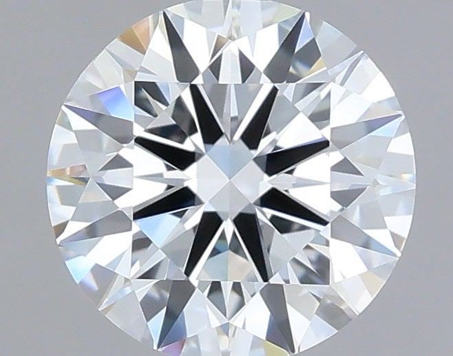 IGI Round 1.25ct D VVS1 Ideal Loose Lab Diamond: IGI Round 1.25ct D VVS1 Ideal Loose Lab Diamond Experience the brilliance of a lab-grown diamond, certified by IGI as a 1.25ct D VVS1 Ideal Round. This exceptional stone boasts an EX polish and symmet
