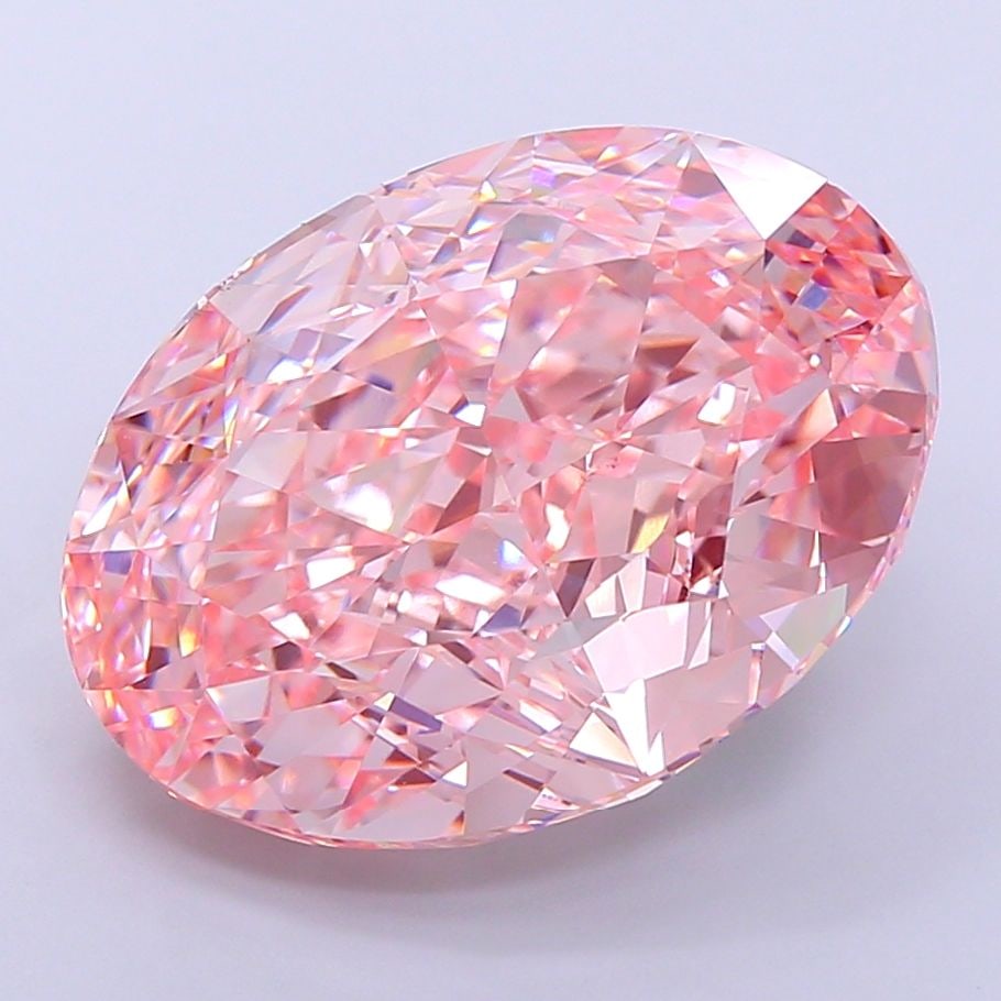 IGI Oval 19.35ct Fancy Vivid Pink VVS2 Loose Lab Diamond: IGI Oval 19.35ct Fancy Vivid Pink VVS2 Loose Lab Diamond Experience the rare beauty of a Fancy Vivid Pink diamond, one of the most coveted colors in the world of gemstones. This exceptional 19.35ct la